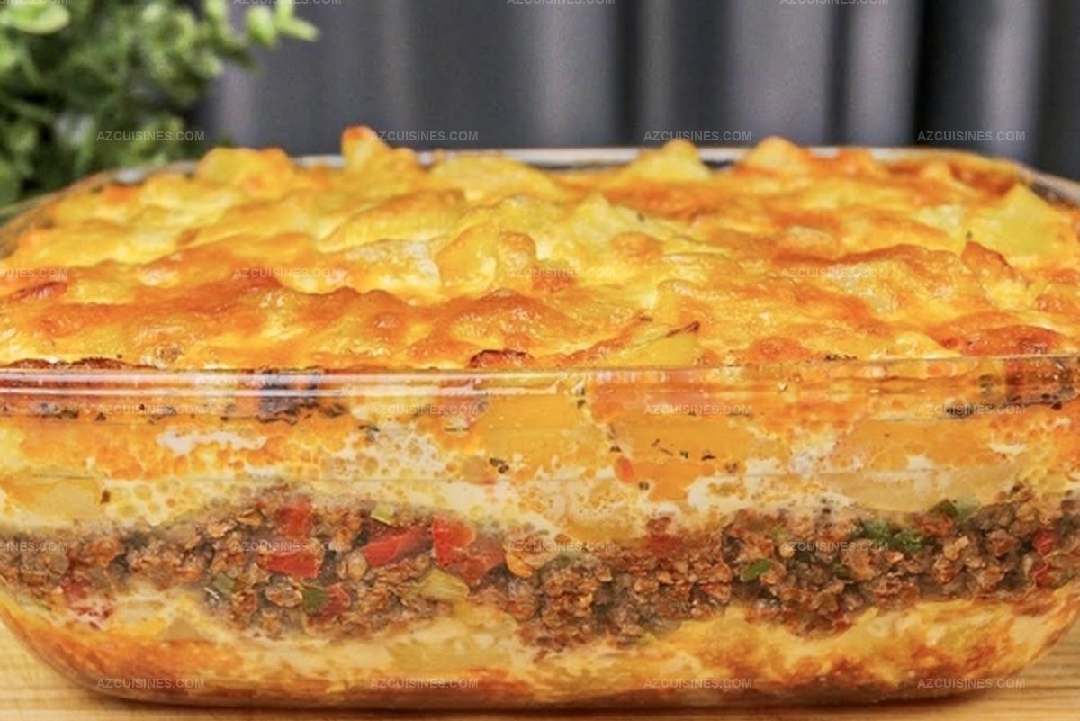 Savory Layered Potato and Meat Bake with Cheesy Topping Recipe