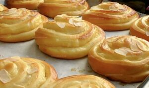 Custard-Filled Sweet Rolls with Almond Flakes Recipe