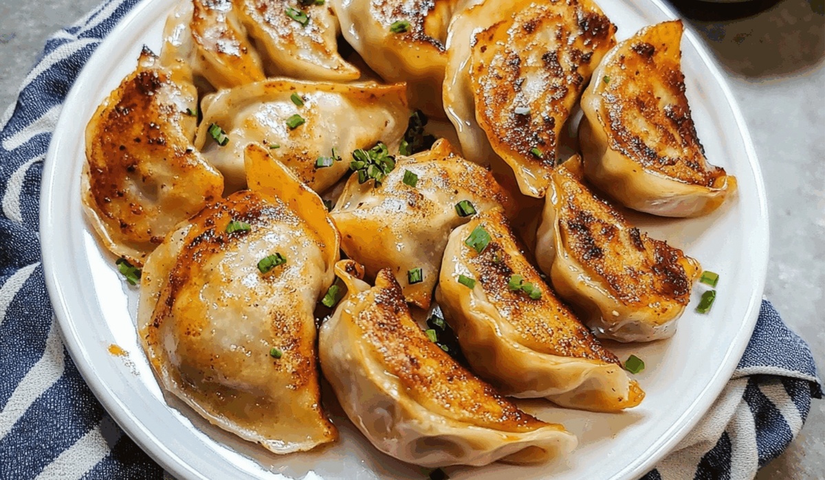 Sheet Pan Spicy Chicken Potstickers With Ginger Sauce Recipe