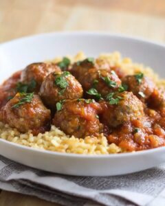 Savory Lamb Meatballs in a Bold Eggplant-Tomato Sauce with a Kick Recipe