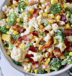 Creamy Broccoli, Cauliflower, Corn, and Bacon Salad Recipe